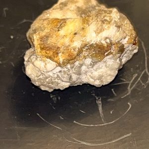 Raw gold in quartz crystal